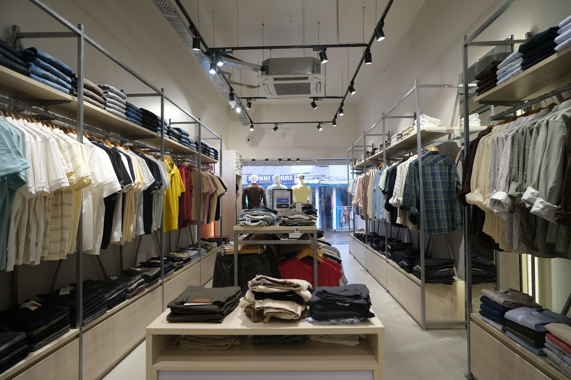 The main aisle of Urban Closet, Goalpara, looking out to the street