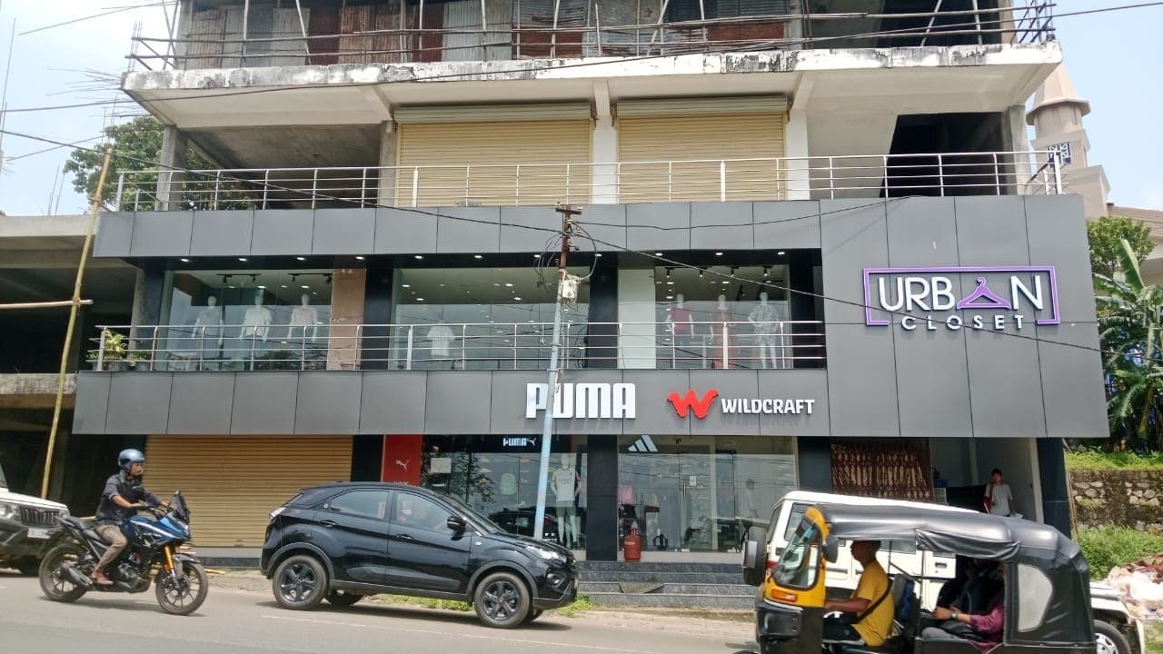Urban Closet, Tura: the two-storey front, with its Puma and Wildcraft fascias.